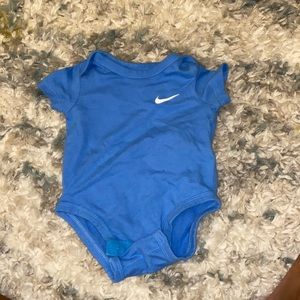 Light blue nike short sleeve onesie